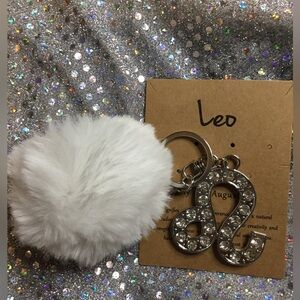 White Fluffy Pom Pom Sliver Keychain with Leo Charm